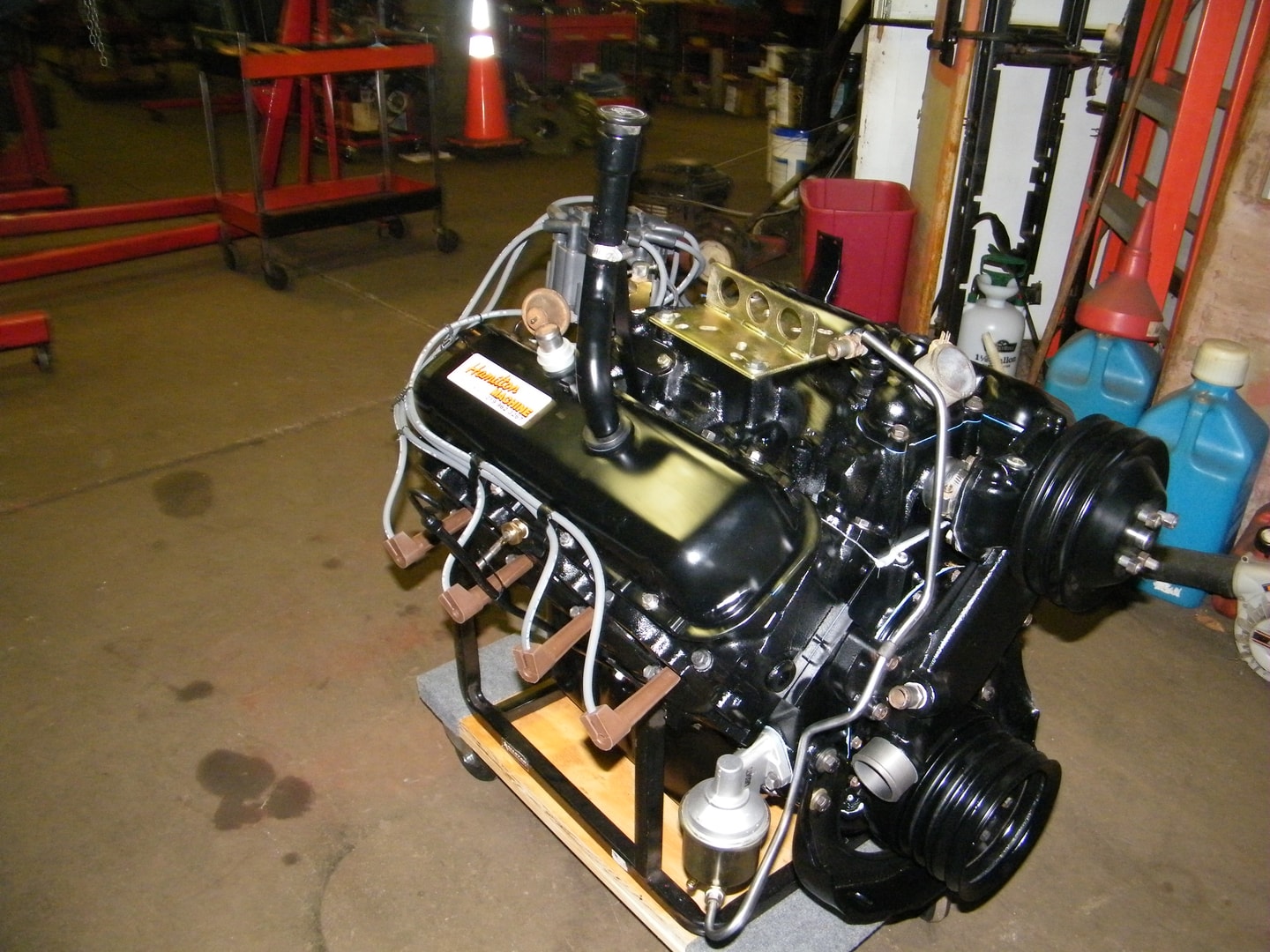 Restored engine on wooden pallet workshop